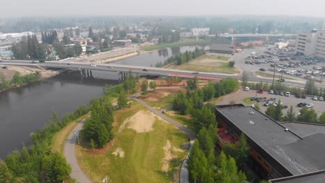 4K-Drone-Video-of-Morris-Thompson-Cultural-Center-on-the-Chena-River-in-Downtown-Fairbanks,-Alaska-on-Summer-Day