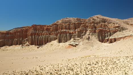 Erosion-of-sandstone-in-the-Mojave-Desert-results-in-natural-monuments-of-spire-rock-in-the-sandy-landscape