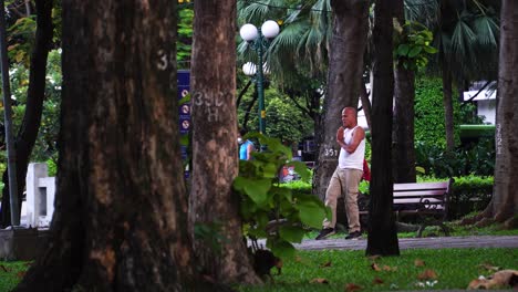Retired-elderly-Asian-man-exercising-in-a-public-park-in-the-morning-in-Vietnam