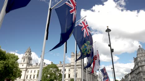 Commonwealth-Flags-Fluttering-In-Wind-At-Parliament-Square-In-Westminster