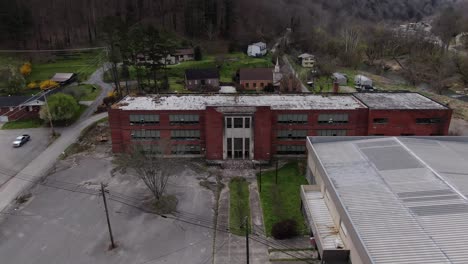 Drone-Footage-Pulling-Back-to-Reveal-the-Front-of-the-Abandoned-M