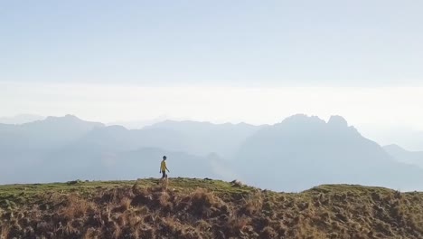 A-men-walks-on-a-huge-mountain-ridge