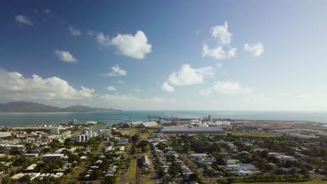 Drone-footage-showing-the-industrial-and-port-area-of-Townsville,-Australia