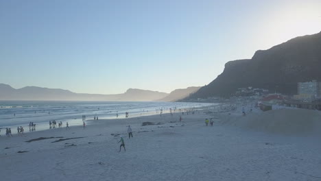 Aerial-flying-along-beach-on-the-coast-of-South-Africa-at-sunrise