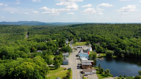 A-forward-moving-aerial-hyperlapse-of-daily-life-in-the-small-town-of-Onawa,-Maine