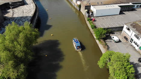Aerial:-Boat-Heading-into-Bristol-City-Down-River-Summer
