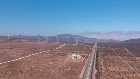 Drone-footage-of-highway-and-eolic-turbines