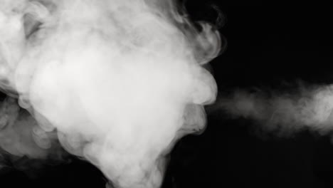 Smoke-shoots-to-the-left-and-right-while-billowing-towards-camera-in-the-center