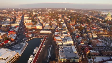 Beautiful-sunrise-panoramic-shot-of-historic-downtown-Annapolis-including-the-US-Naval-Academy,-Maryland-State-Capital-building,-and-Eastport-bridge