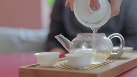 This-Chinese-specialty-tea-is-poured-into-a-personal-teapot-in-a-cafe-in-Holland