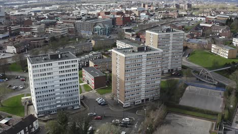 High-rise-tower-blocks,-flats-built-in-the-city-of-Stoke-on-Trent-to-accommodate-the-increasing-population,-housing-crisis-and-over-crowding,-immigration