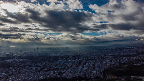 Aeiral-hyeprlapse-of-very-windy-morning-in-Mexico-City-with-clouds-and-light-rays