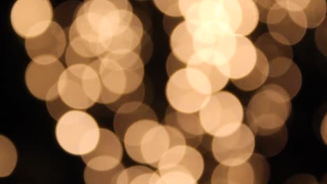Fuera-De-Foco-Luces-Amarillas-De-Bokeh-Provenientes-De-Un-árbol-De-Navidad