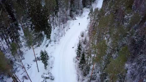 Aerial,-drone-shot-of-professional-cross-country-skier