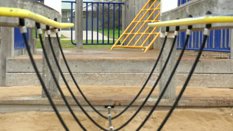 Rope-or-chain-bridge-at-a-children's-beachside-playground