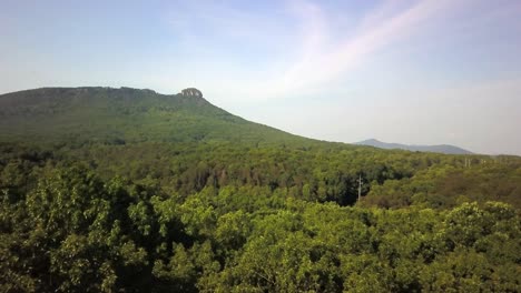 Aerial-in-4K-of-Pilot-Mountain-in-the-distance