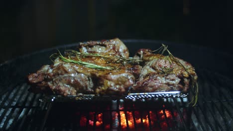 Beautiful-Butterflied-Lamb-covered-in-rosemary-and-garlic-rests-on-a-rack-as-the-coals-in-the-Barbeque-cook-it-to-perfection