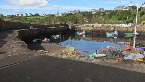 Fishing-boat-entering-Crail-Harbour-in-Fife-Scotland