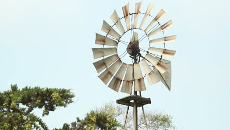 Windmill-spinning-in-the-wind-in-slow-motion