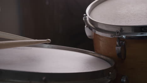 Jazz-Drummer-Hits-Snare-Drum-In-Slow-Motion,-Low-Angle-Close-Up