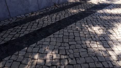 Black-and-white-Portuguese-calcada-pavement-in-Tavira,-Portugal