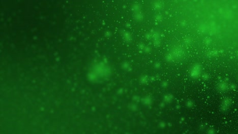 Green-lime-particles-floating-in-low-light