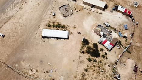 Aerial-shot-of-a-compound-in-the-desert