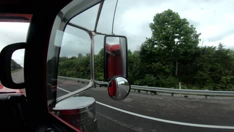 Cutaway-shot-along-the-interstate-highway-out-truck-window