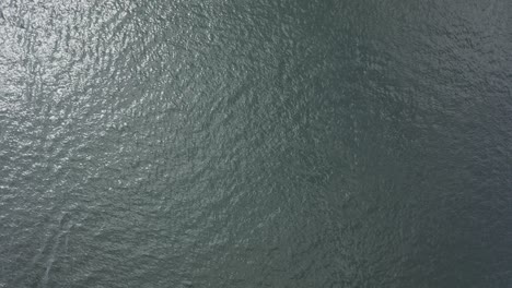 Calm-water-surface-background,-loopable,-aerial-view