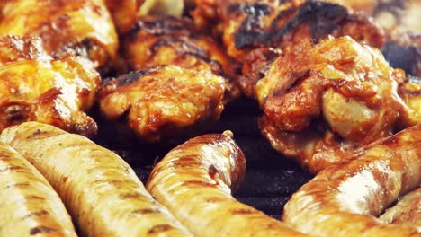 Assorted-delicious-grilled-meat,-Top-view,-sausages,-chicken,-pork