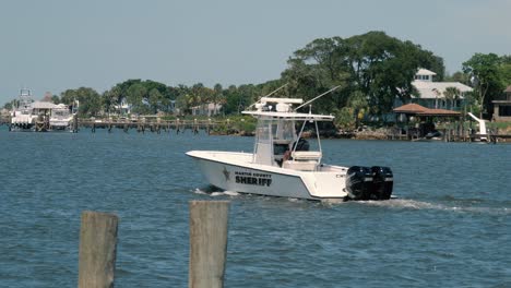 Martin-County-Sheriff-boat-patrol-motoring-down-the-Stuart-Manatee-Pocket-waterway-in-Florida