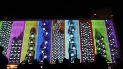 Light-show-of-marbles-on-facade-of-large-building-at-event-in-the-Netherlands