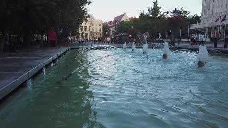 Busy-Hviezdoslavov-square-with-fountains-in-Bratislava,-Slovakia