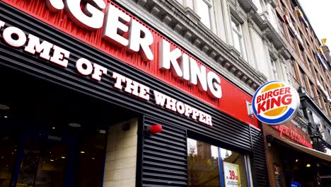 Shop-front-of-the-Copenhagen-Burger-King-fast-food-restaurant,-tracking-shot