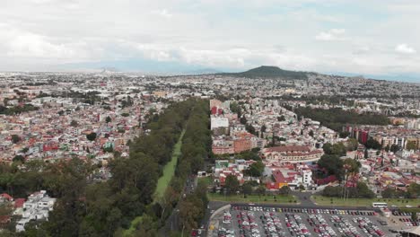 Aerial-view-of-"Cerro-de-la-Estrella"-and-"Canal-Nacional"-in-southern-Mexico-city