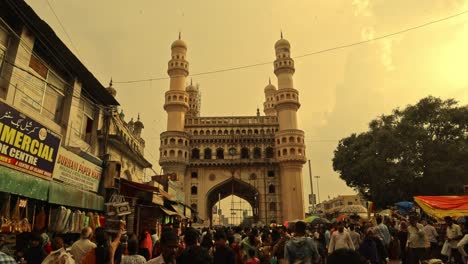 Monument-Charminar-at-Hyderabad-with-Busy-crowd---Concept-of-Overtoursism-showing-with-over-polluted-people-in-India---the-concept-of-lost-in-crowd