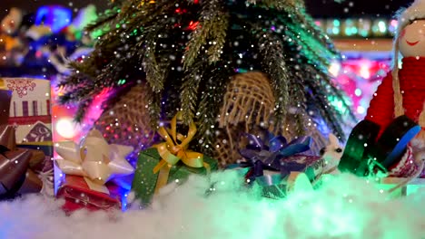 Sliding-close-up-of-a-Christmas-tree-with-presents-under-it