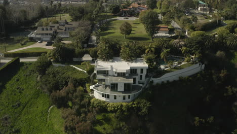 Flying-over-mansion-on-a-hillside-in-Malibu