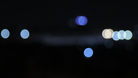 Moving-shots-of-Light-bokeh-created-by-street-lights