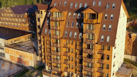 Vucko-Aparthotel-chalet-for-winter-sports-in-the-Dinaric-Alps,-frequented-for-Olympic-competitions,-Aerial-dolly-in-shot