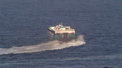 Isolated-Sea-Ship-making-a-Turn,-Emitting-Exhaust-Dark-Gases-SLOMO