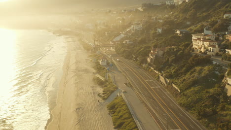 4K-flight-over-the-PCH-and-ocean-during-golden-sunset