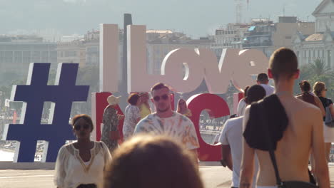 I-Love-Nice-Sign-at-French-Riviera-and-Tourists-Walking-at-Boulevard
