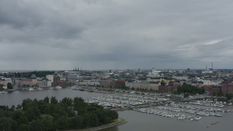 Drone-view-above-port-with-many-docked-yachts-and-boats-in-Helsinki-Finland