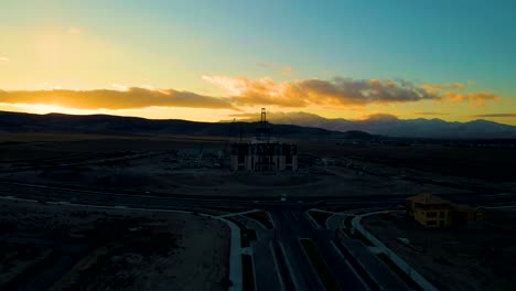 LDS-Mormon-Temple-under-construction-at-sunset---aerial-orbiting-view