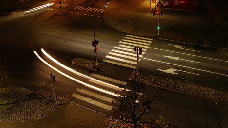 Time-lapse-of-zebra-cross-on-city-street-at-night