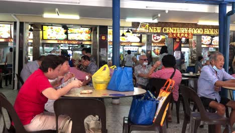 Group-of-people-eating-and-drinking-coffee-shop-in-Toa-Payoh