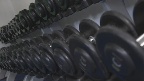 Black-dumbbells-in-a-row-with-focus-shift