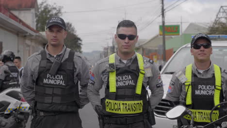 Costa-Rican-police-pose-for-portrait-shot-in-Cartago,-Costa-Rica-during-parade-on-festival-day