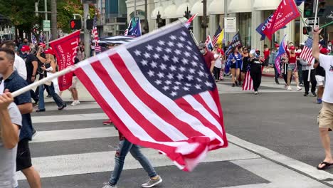 Trump-supporters,-American-Flag,-rally-campaign-on-Rodeo-Drive-in-Beverly-Hills